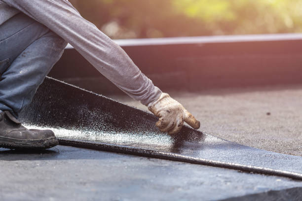 Professional Basement Waterproofing technician working in Mendota, IL